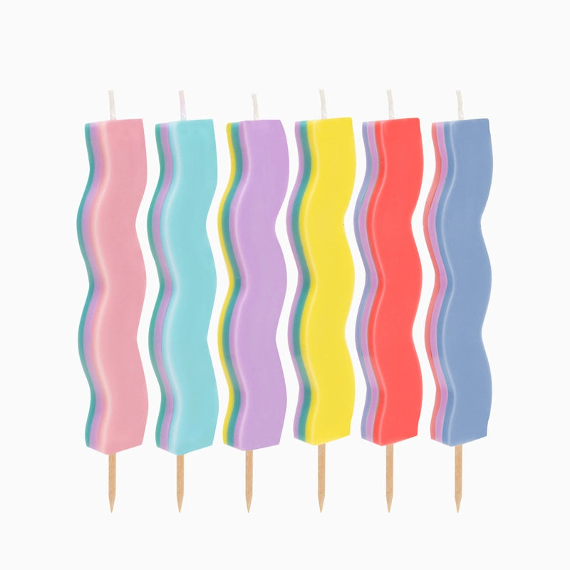 Vela ondulada multicolor colores surtidos u.v 10cm cera 6 uds